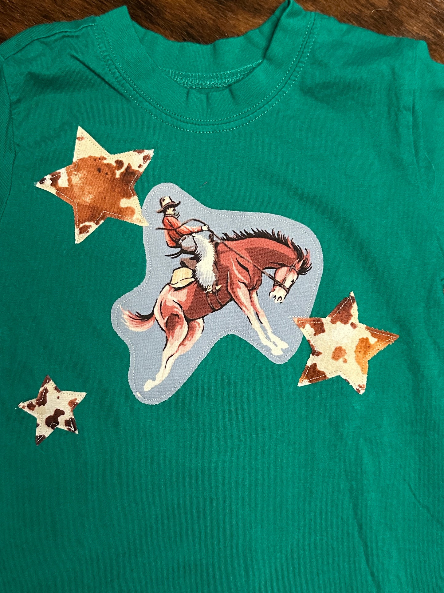 Vintage Bronc with Cowhide Print Stars on Green Tee, Size 5T