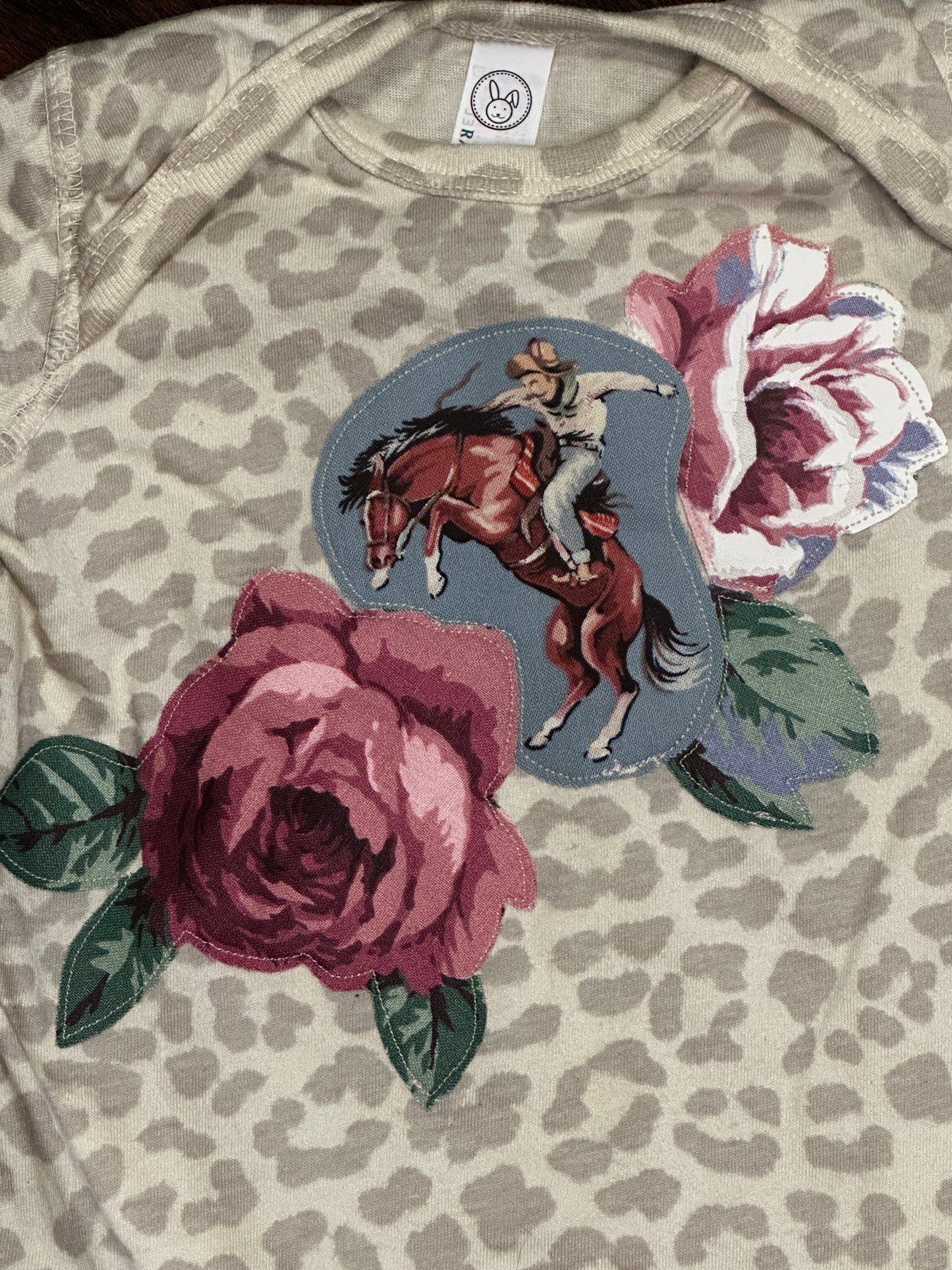 Bronc Rider & Roses on Light Leopard Onesie, Size 12 mons.