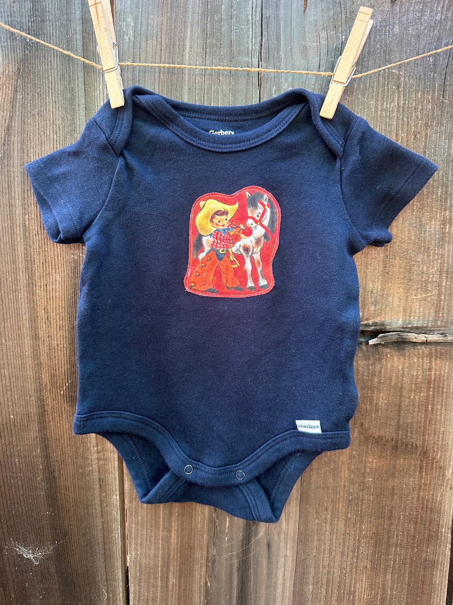 Cowkids on Navy, Size 0-3 mons.