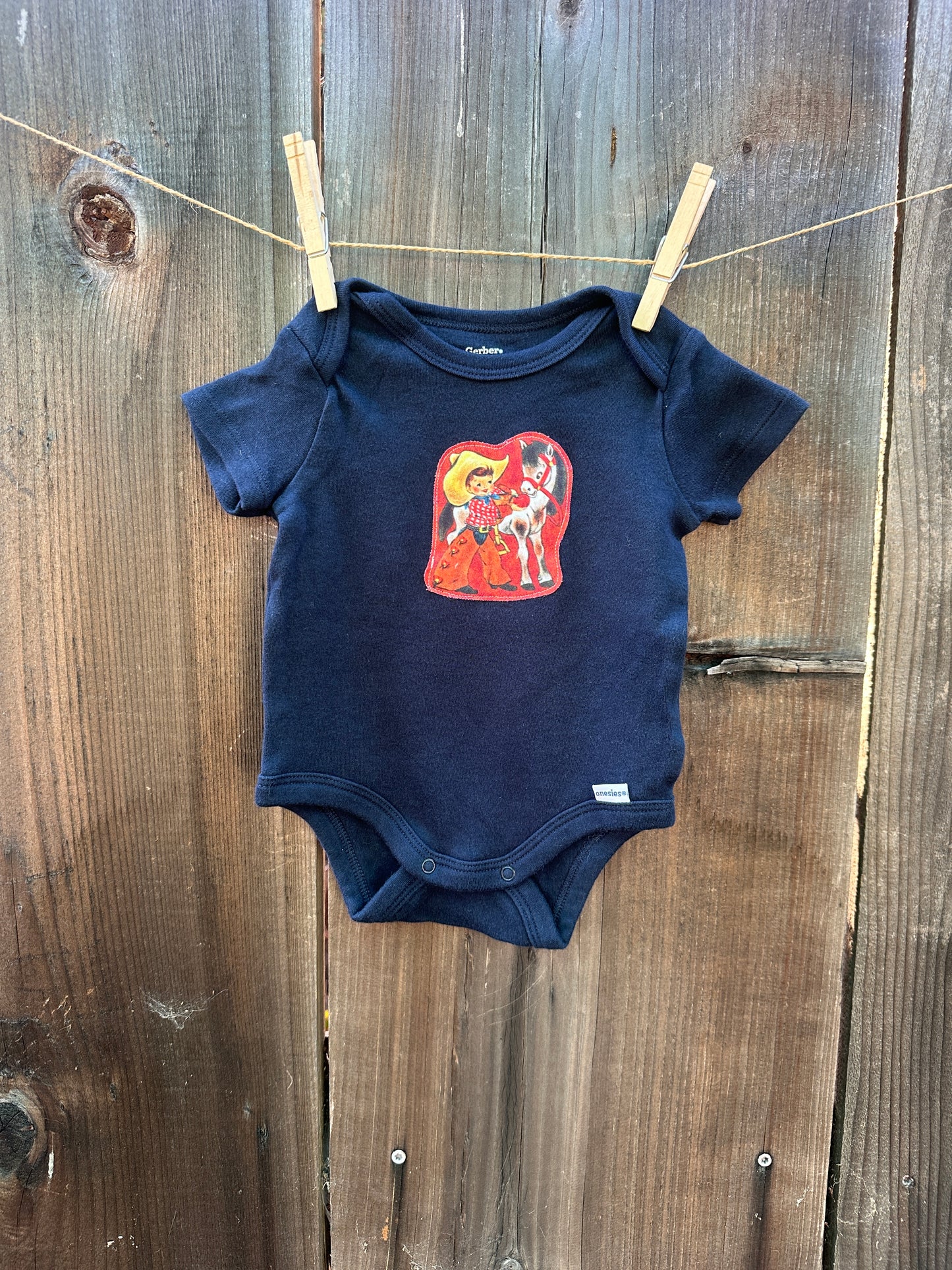 Cowkids on Navy, Size 0-3 mons.