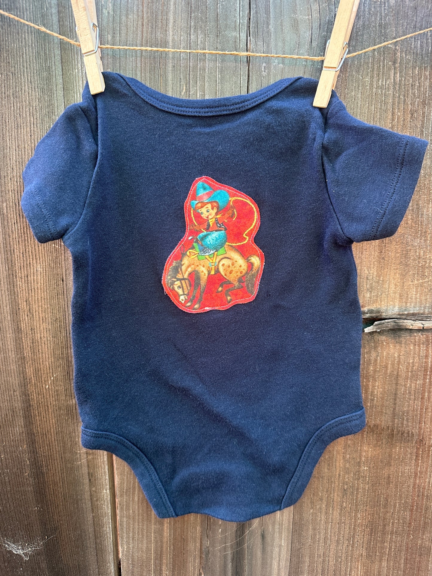Cowkids on Navy, Size 0-3 mons.