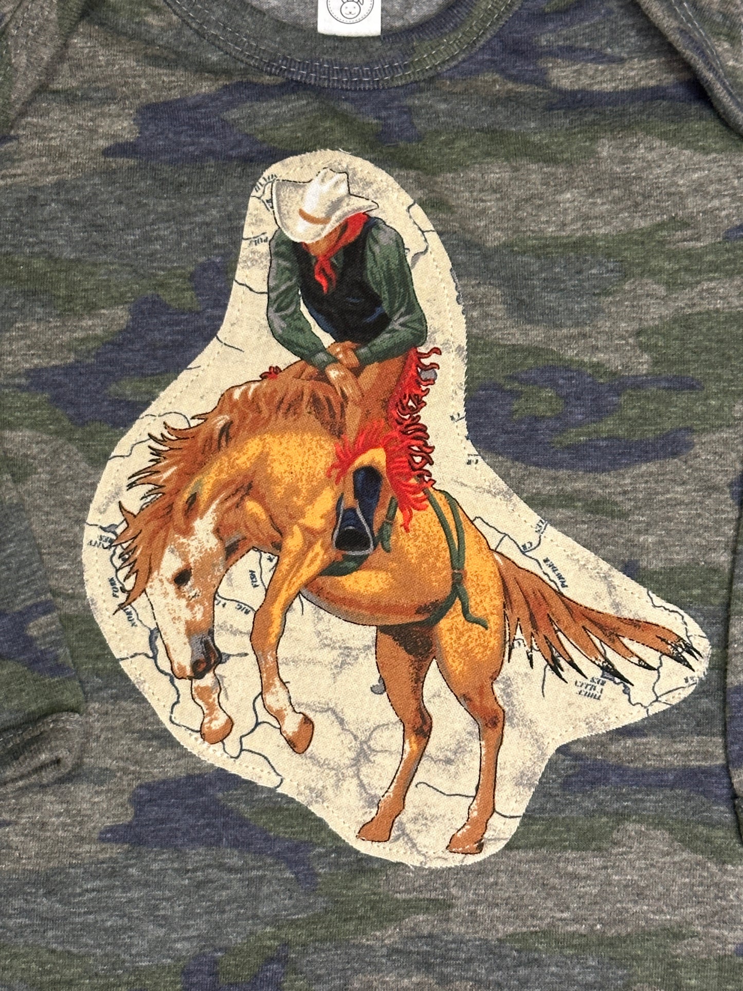 Bronc Rider on Camo Long Sleeve Onesie, Size 18 mons.