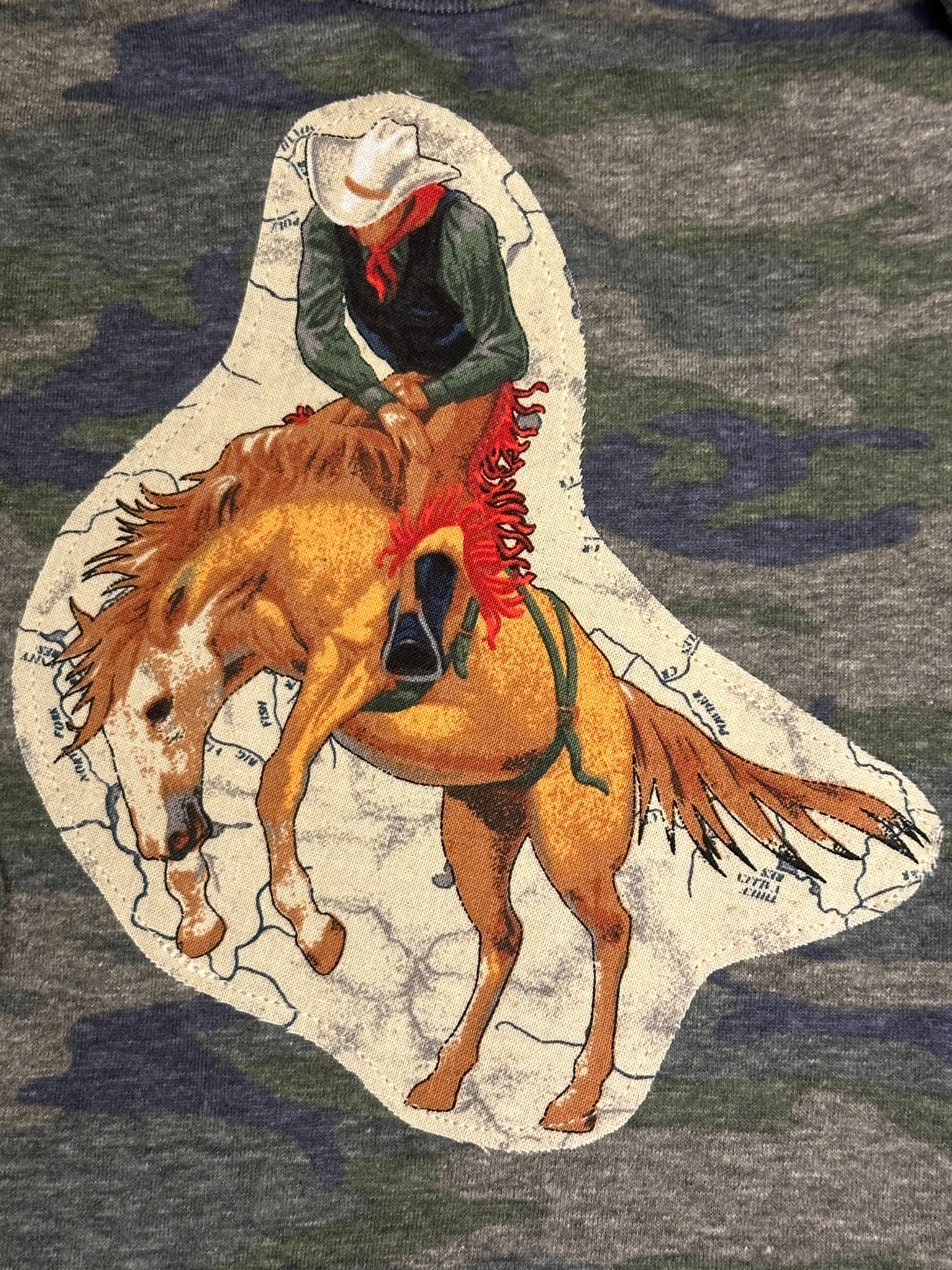 Bronc Rider on Camo Long Sleeve Onesie, Size 18 mons.