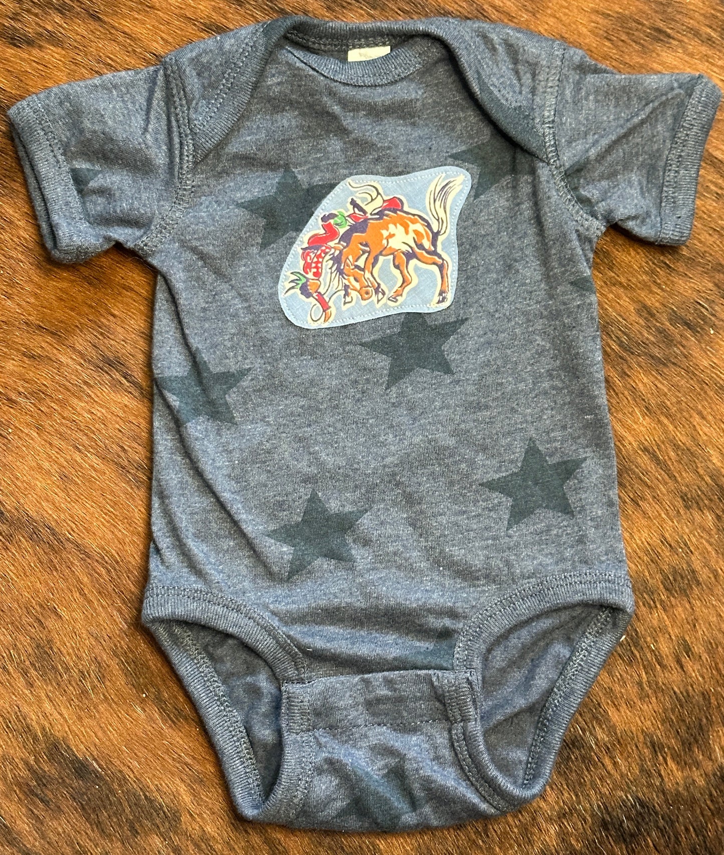 Riding for a Fall Blue Heathered Star Onesie, Size Newborn