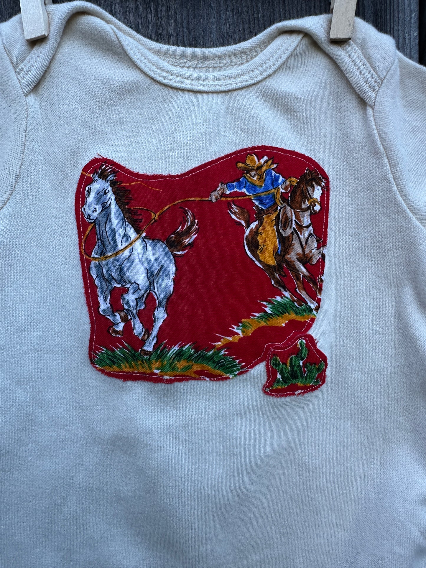 Wild Horse Roper on Cream Onesie, Size 3-6 mons.