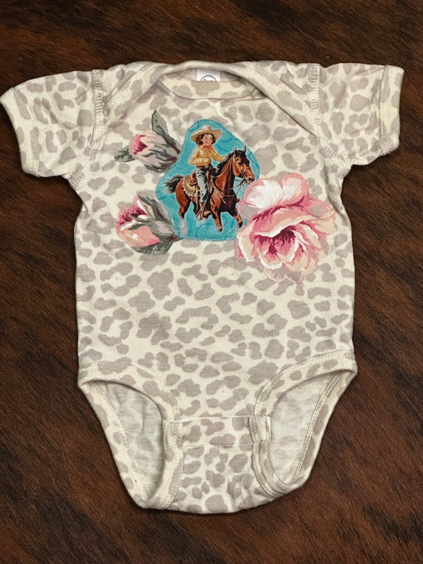 Turquoise Cowgirl & Roses on Light Leopard Onesie, Size Newborn