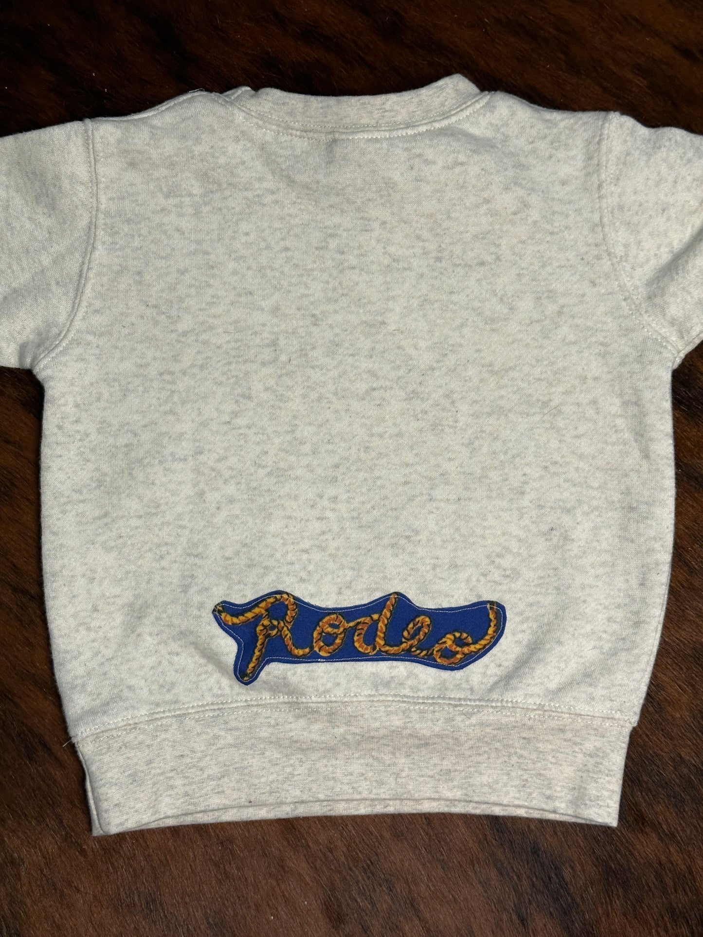 Bucking Horse with “Rodeo” Text on Back Sweatshirt, Size 2T