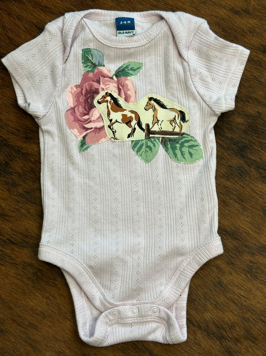 Running Horses & Rose on Lavender Pointelle Onesie, Size 3-6 mons.