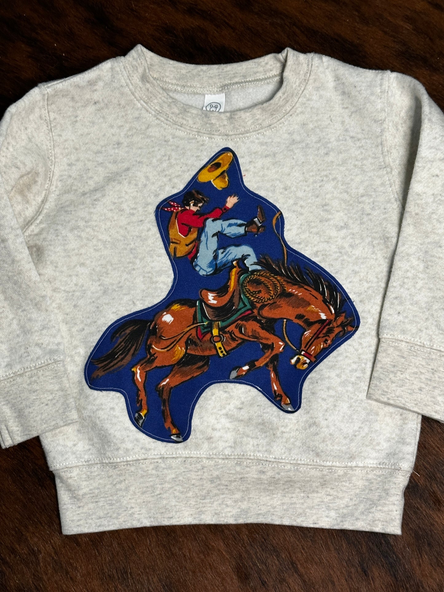 Bucking Horse with “Rodeo” Text on Back Sweatshirt, Size 2T