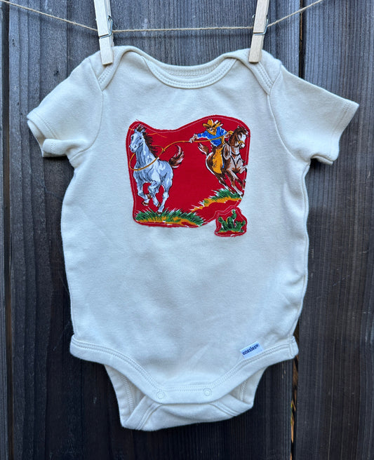 Wild Horse Roper on Cream Onesie, Size 3-6 mons.