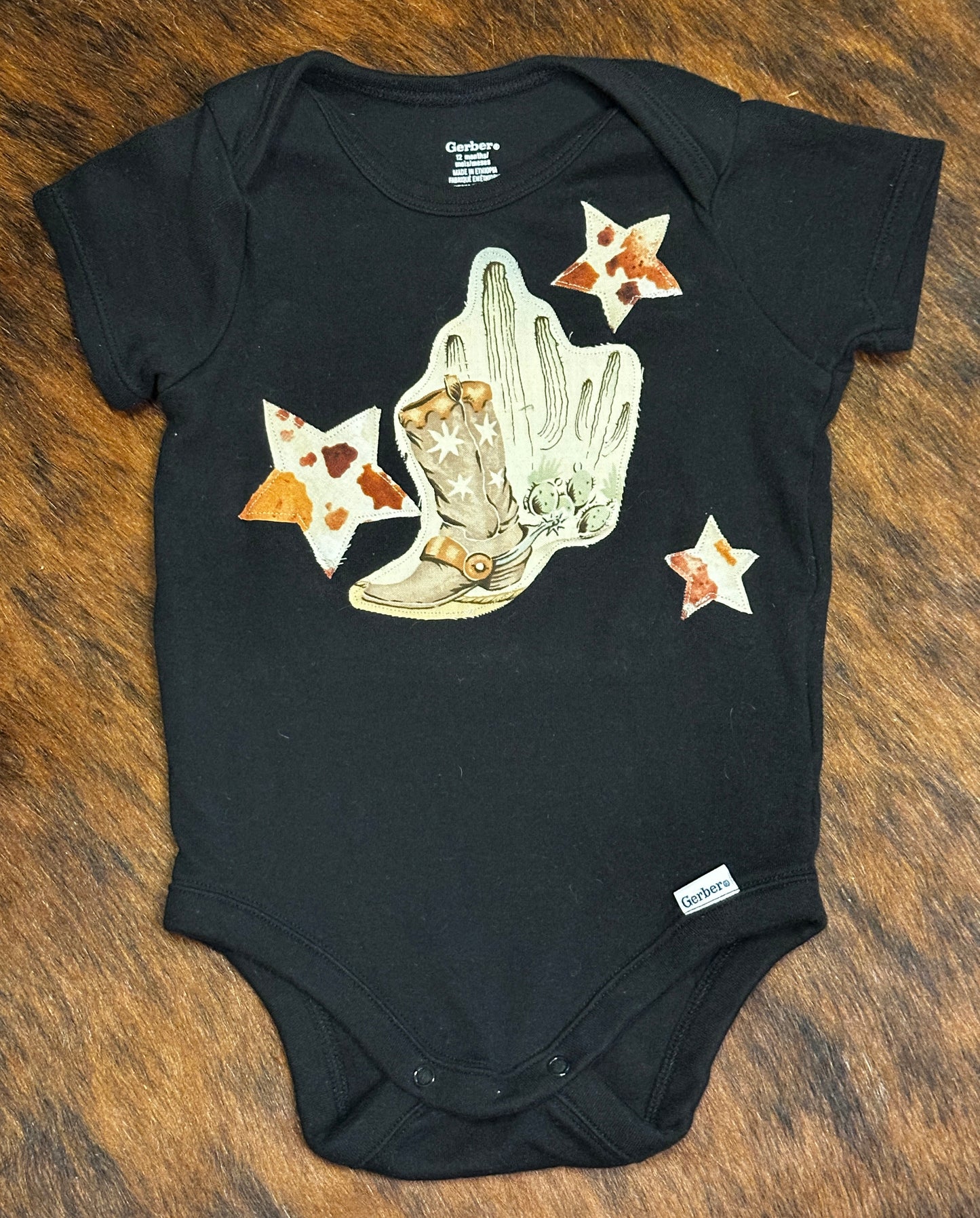 Southwest Scene & Cowhide Print Stars on Black Onesie, Size 12 mons.