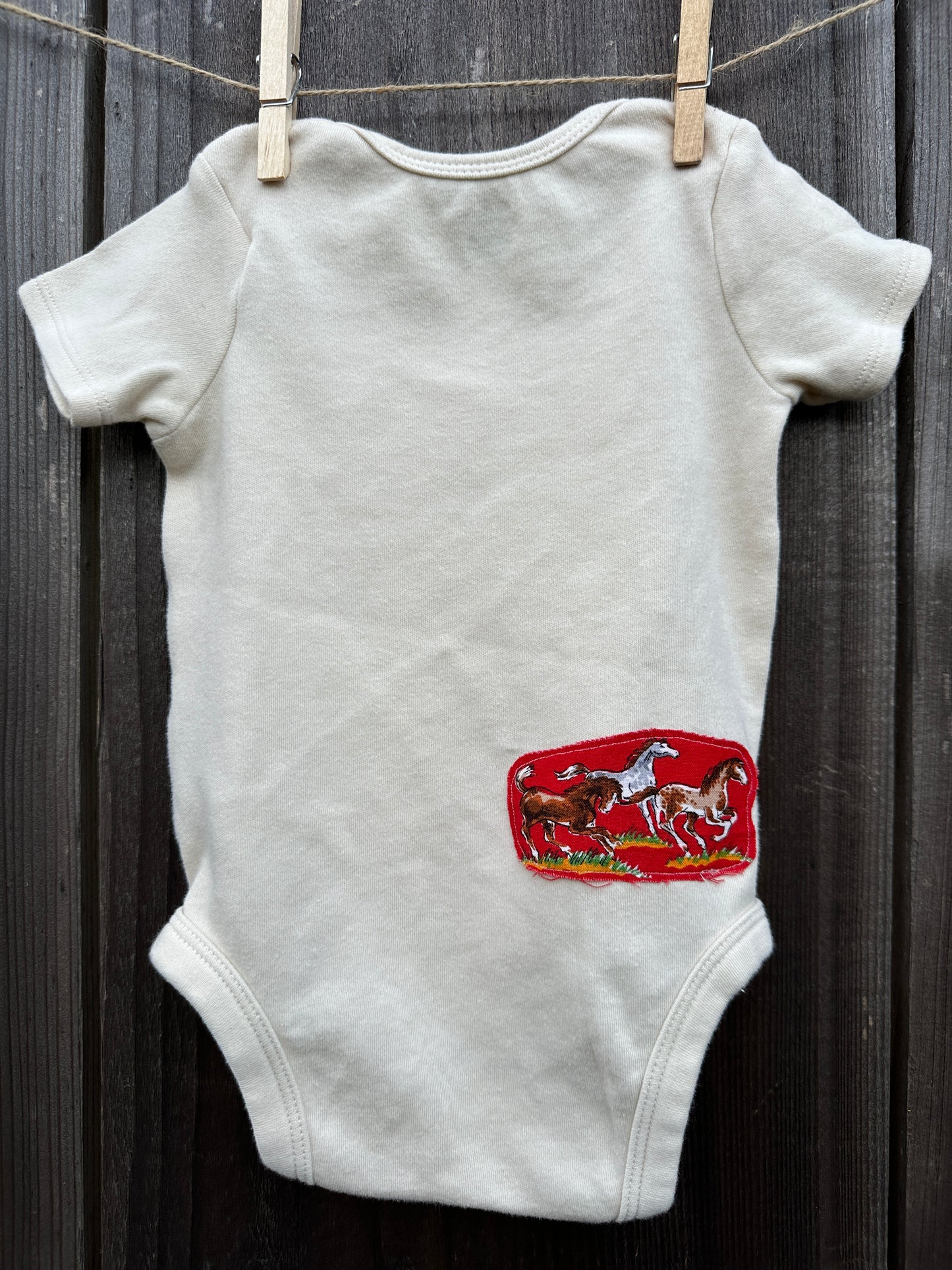 Wild Horse Roper on Cream Onesie, Size 3-6 mons.