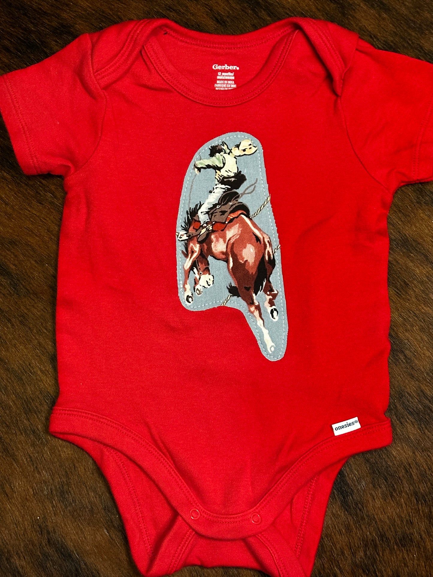 Bucking Bronc Red Onesie, Size 12 mons.