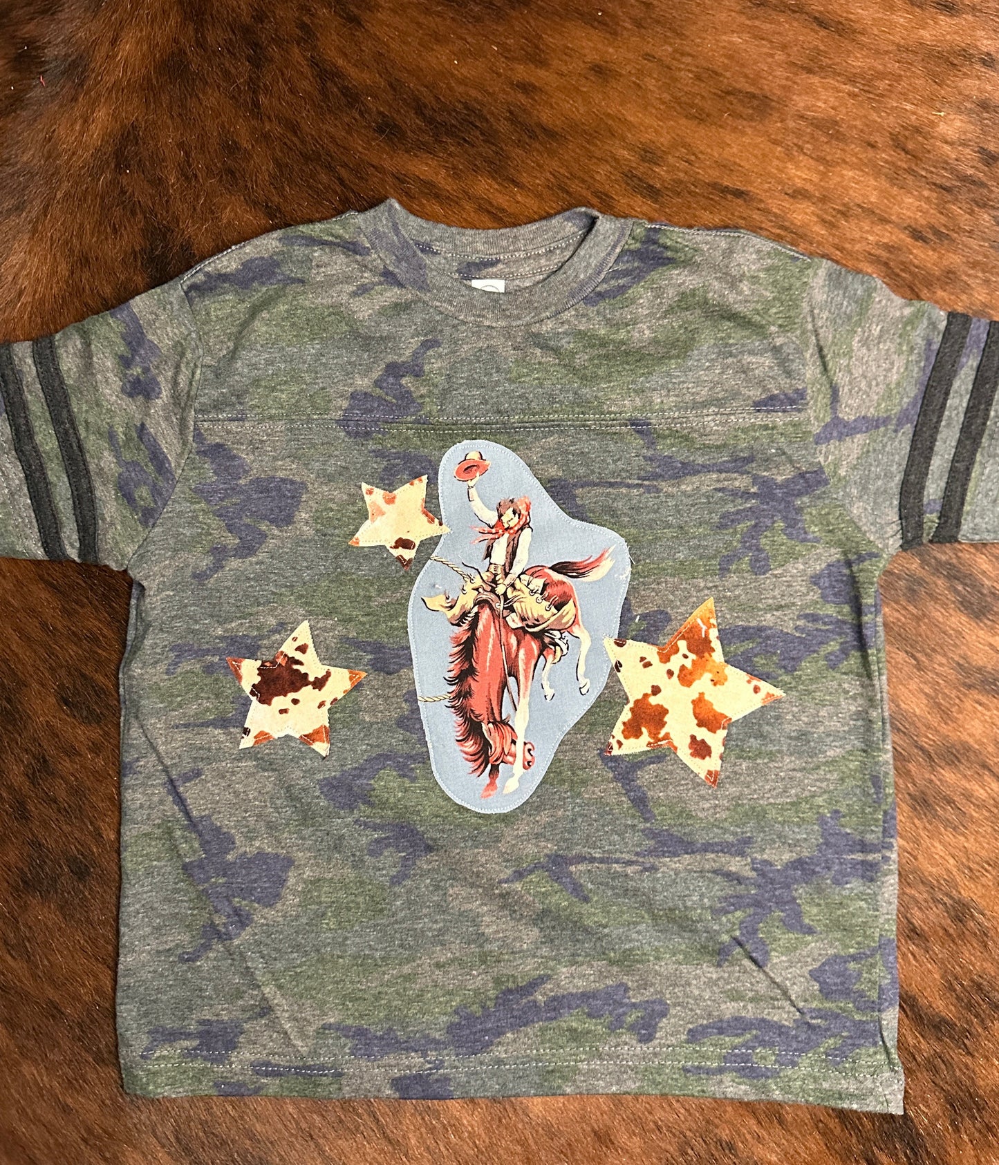 Bronc Rider & Cowhide Print Stars on Football Stripe Camo Tee, Size 4T