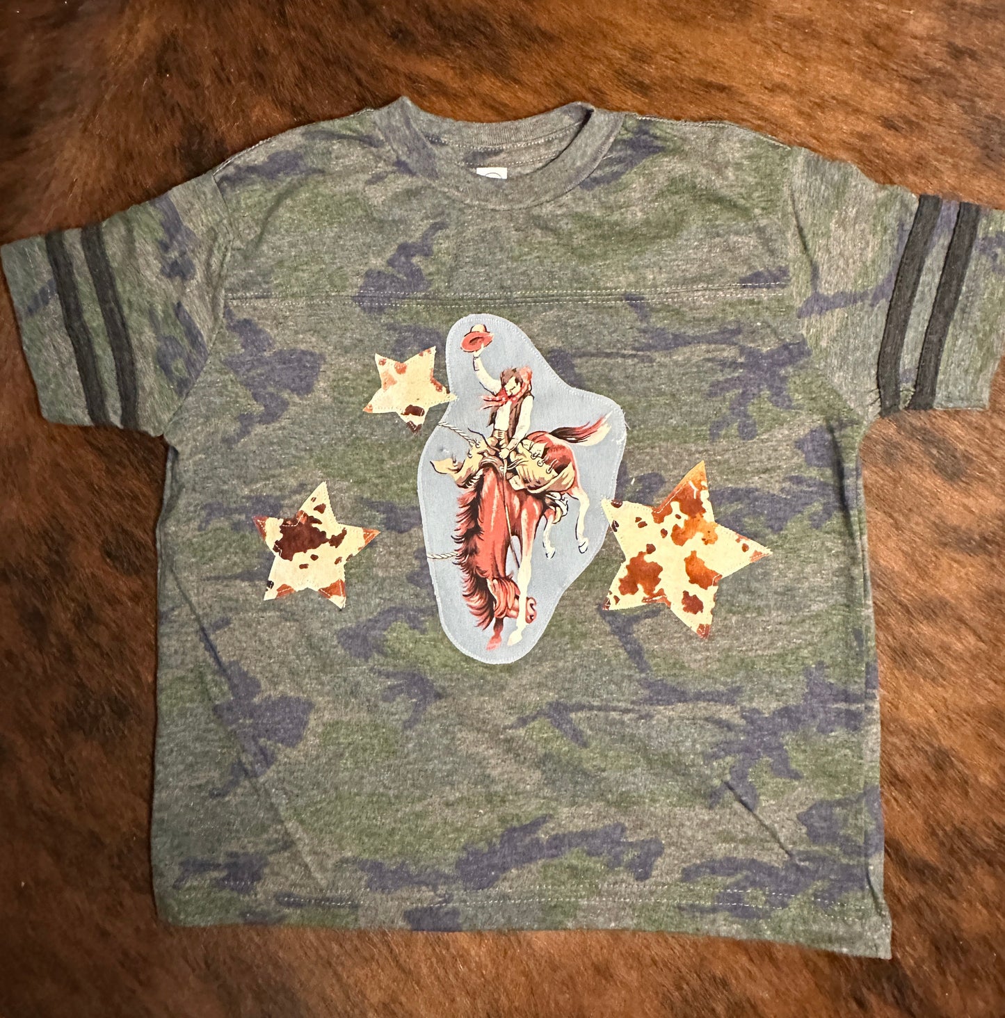 Bronc Rider & Cowhide Print Stars on Football Stripe Camo Tee, Size 4T