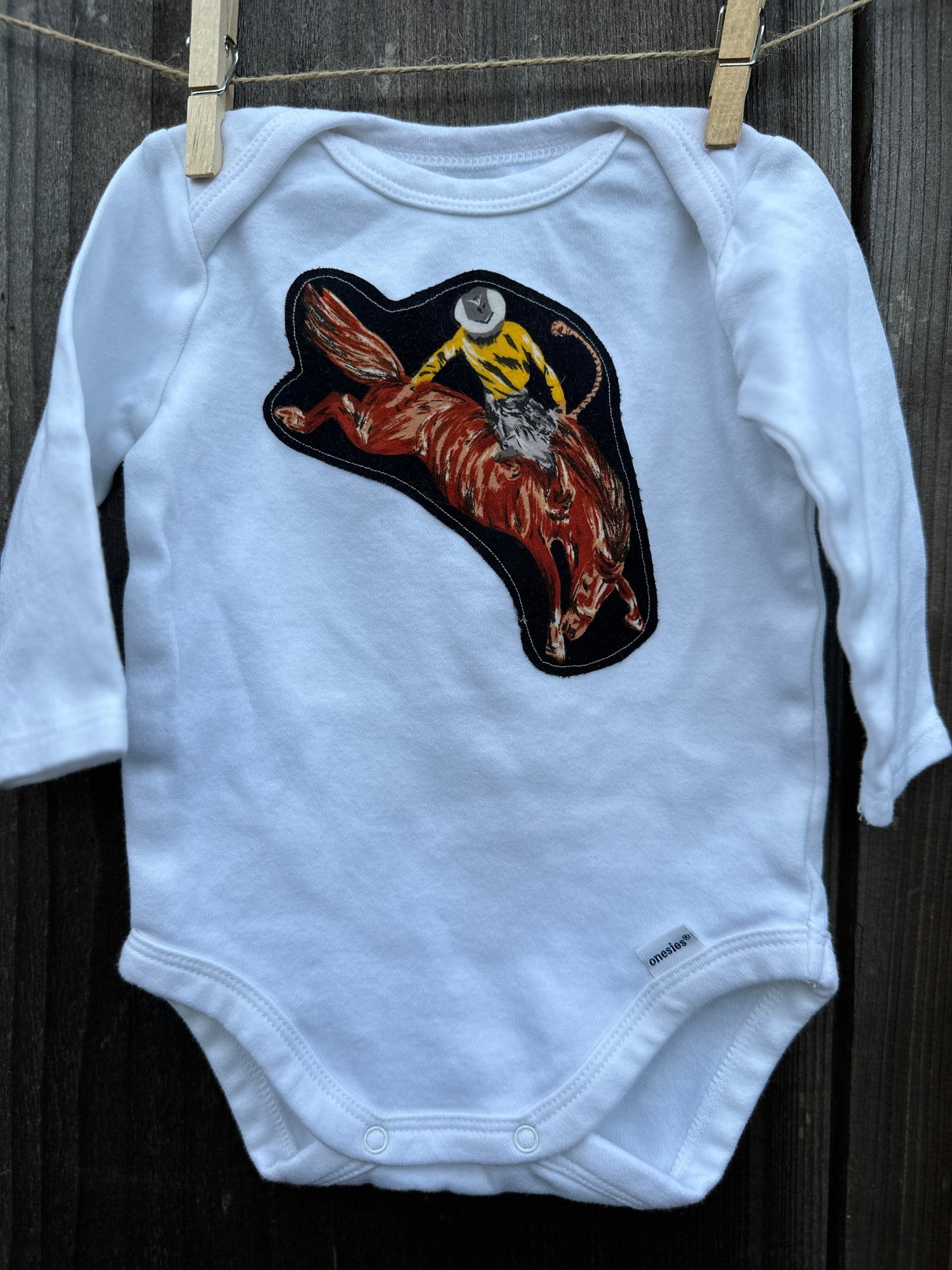Bronc Rider on Long Sleeved Onesie, Size 0-3 mons.