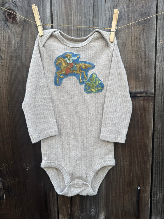 Ribbed Light Tan Onesie with Blue Cowboy, Size 18 mons.