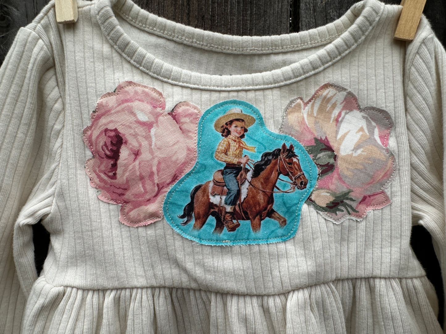 Turquoise Cowgirl with Pastel Roses on White Peplum, Size 24 mons.