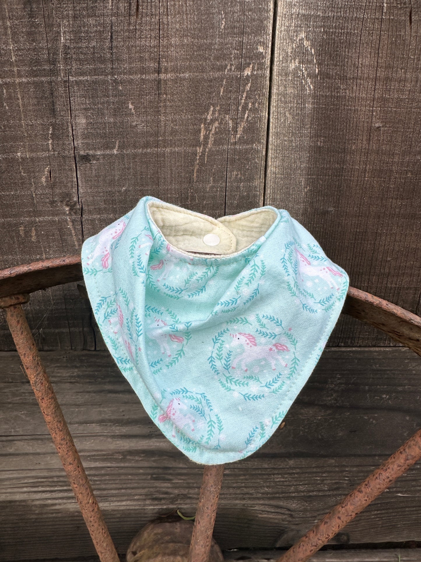 Turquoise unicorn Buckaroo Baby Bib