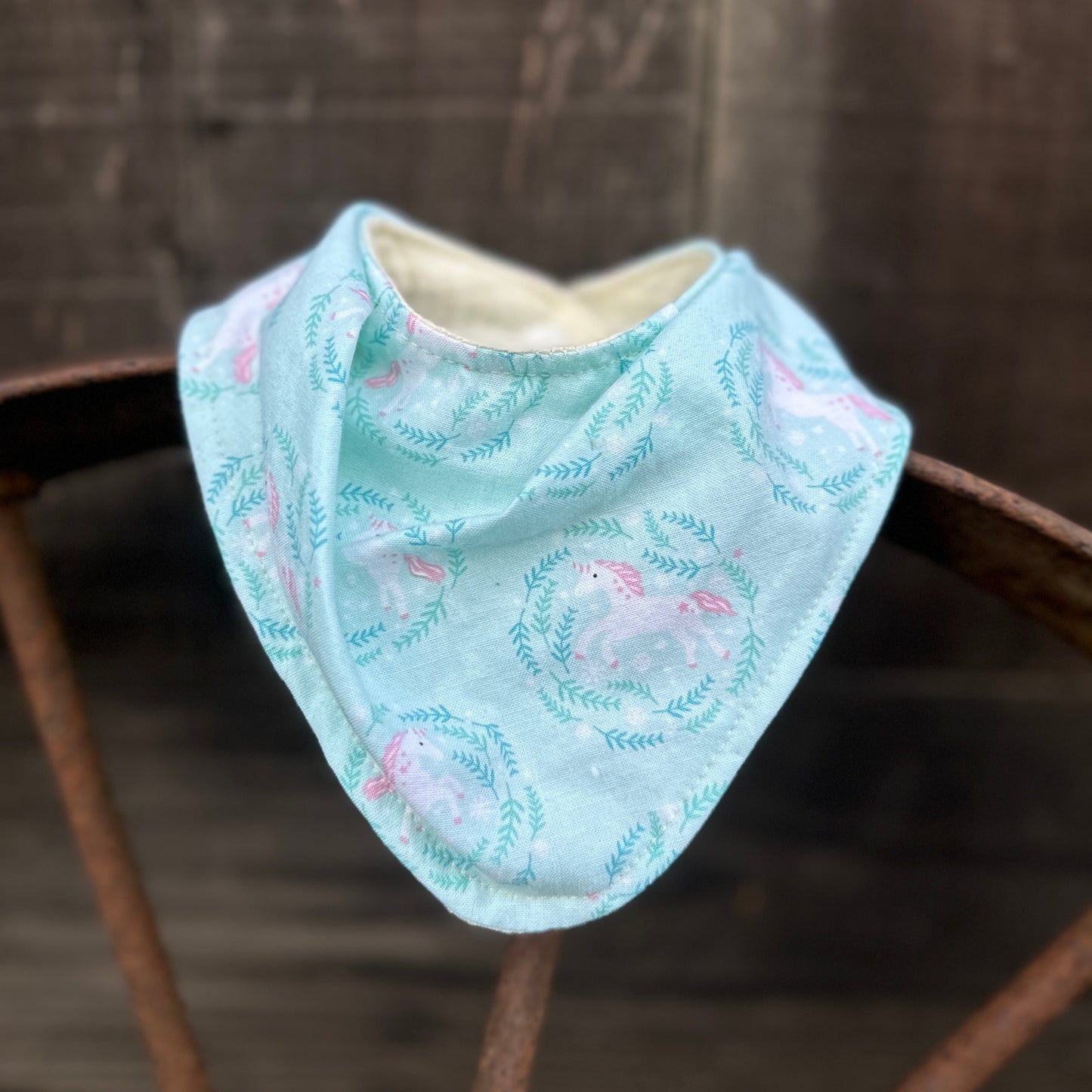 Turquoise unicorn Buckaroo Baby Bib