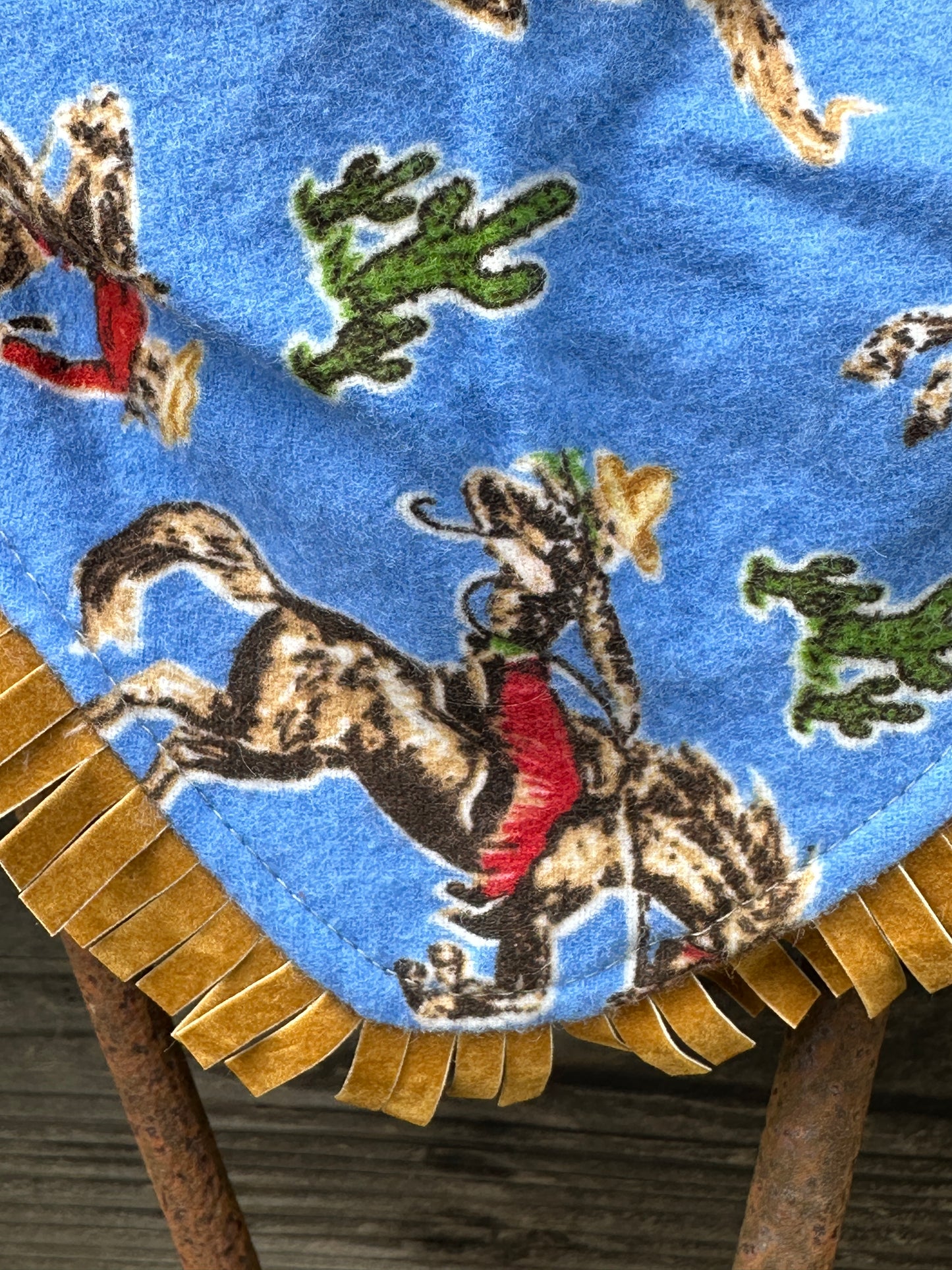 Bronc Rider on Blue Flannel Buckaroo Baby Bib