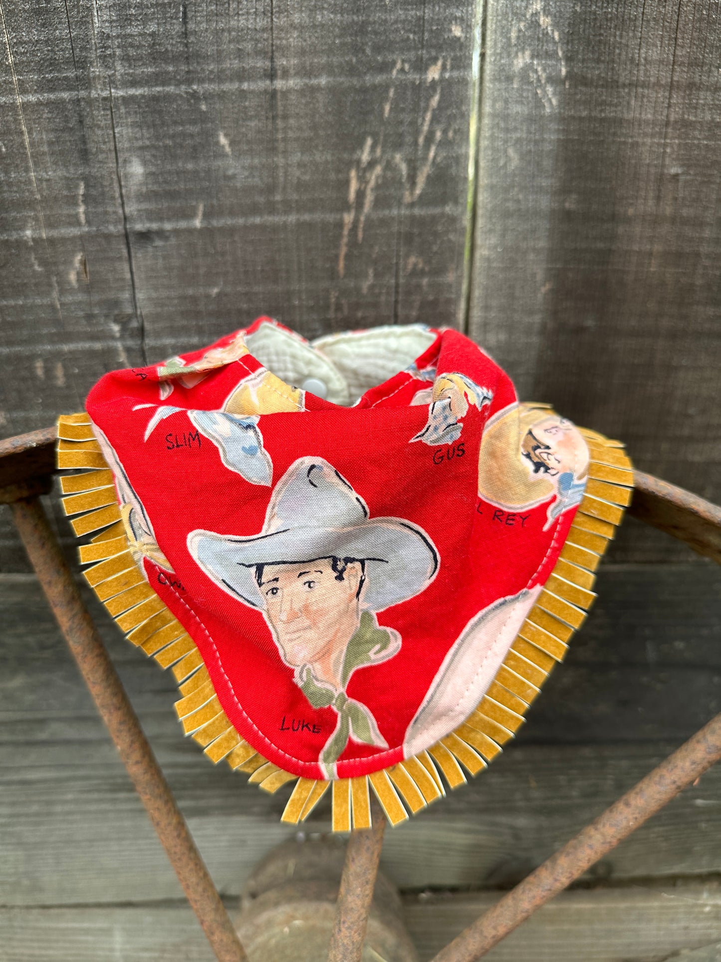 Cowboy Luke on Red Buckaroo Baby Bib