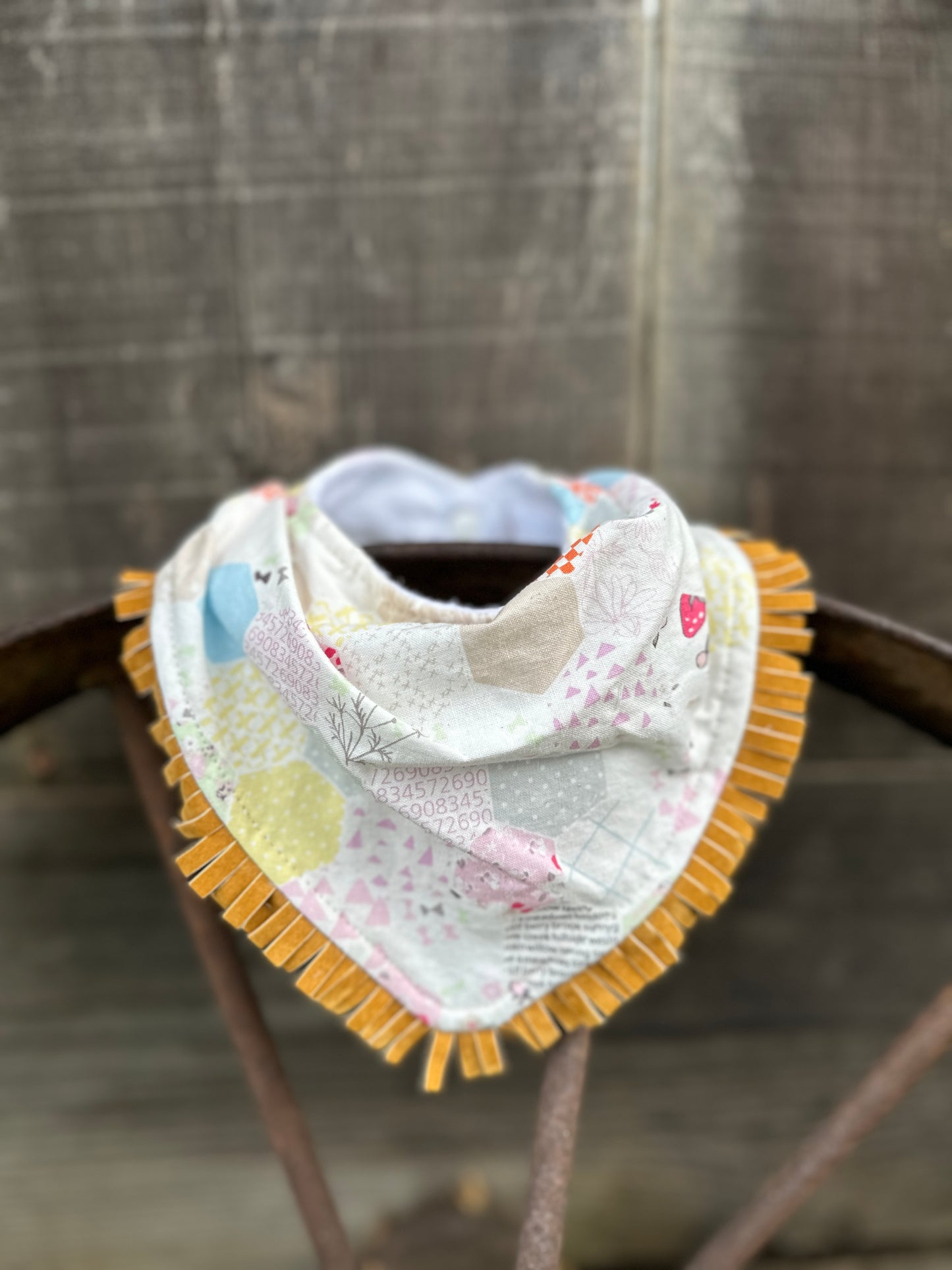 Quilted Pastel Print Buckaroo Baby Bib; Available with & without Fringe