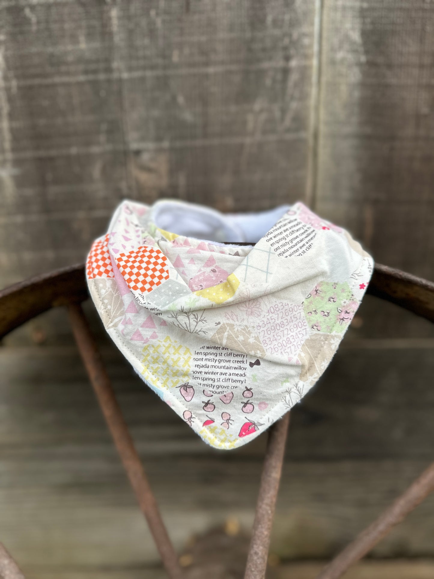 Quilted Pastel Print Buckaroo Baby Bib; Available with & without Fringe