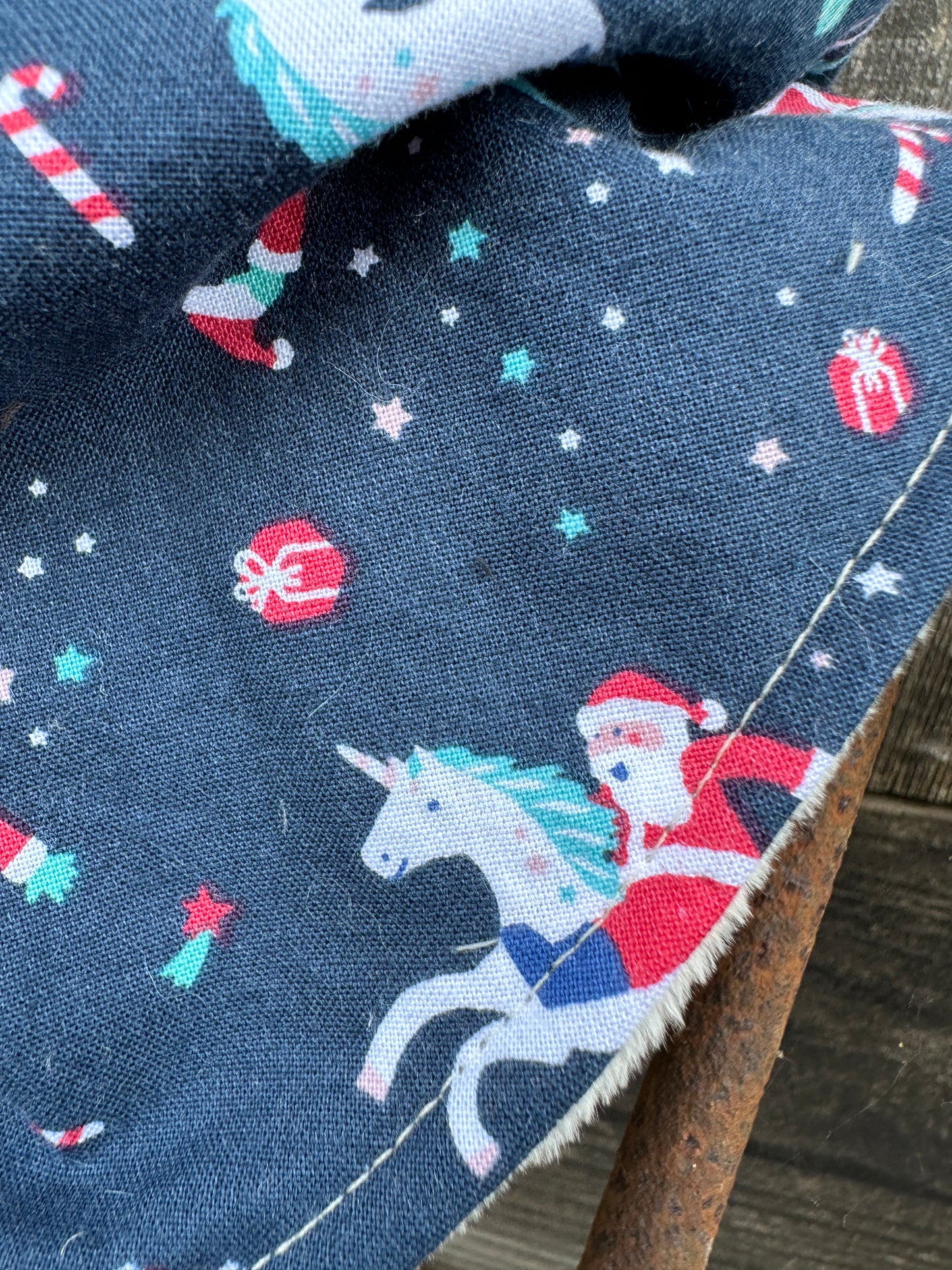 Navy Santa Riding Unicorn Buckaroo Baby Bib